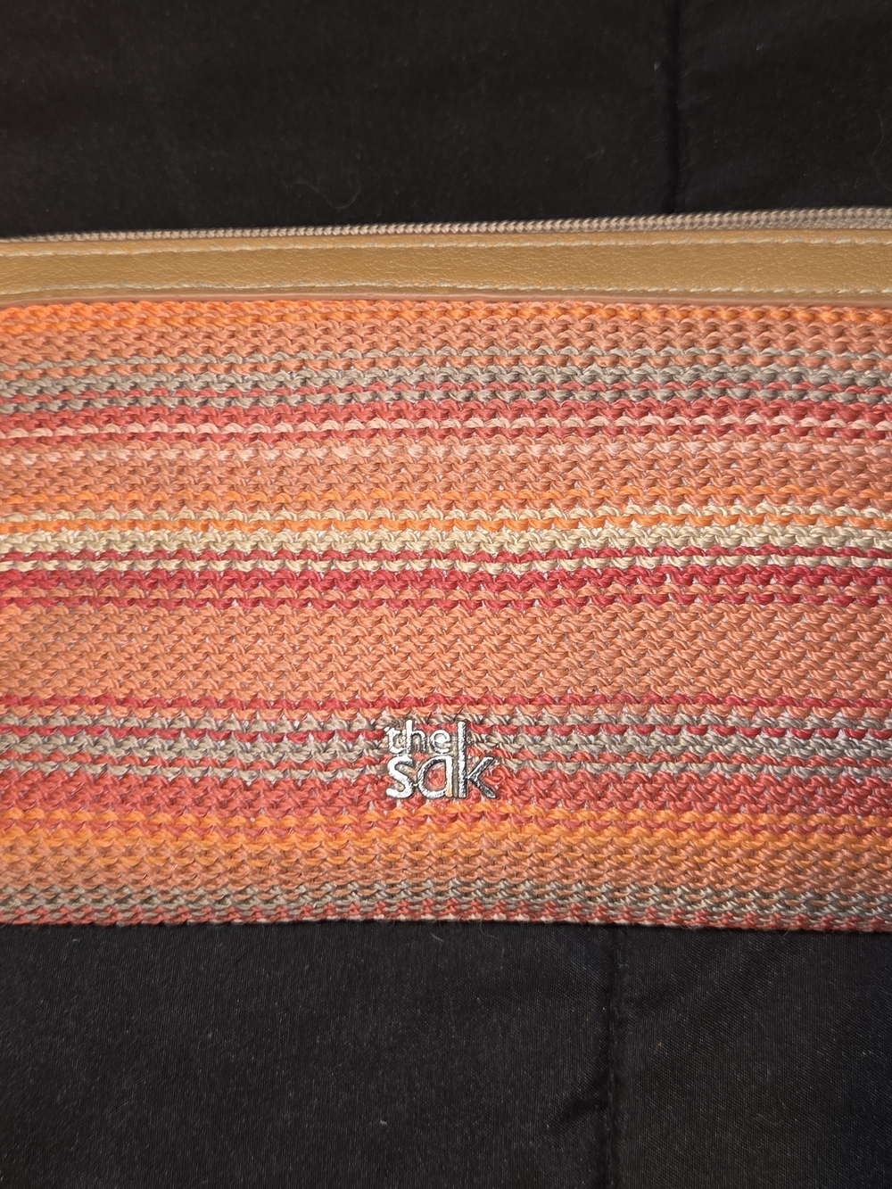 The Sak Orange Multi Woven Clutch
